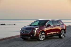 The first-ever 2017 Cadillac XT5 is a comprehensively upgraded luxury crossover and the cornerstone of a new series of crossovers in the brand’s ongoing expansion. The XT5 further builds on Cadillac’s trademark attributes of distinctive, sophisticated and agile vehicles. Pictured: 2017 Cadillac XT5 Platinum; Exterior paint shown in in Red Passion Tintcoat; Interior environment shown in Maple Sugar with Jet Black accents and Satin Rosewood wood trim.